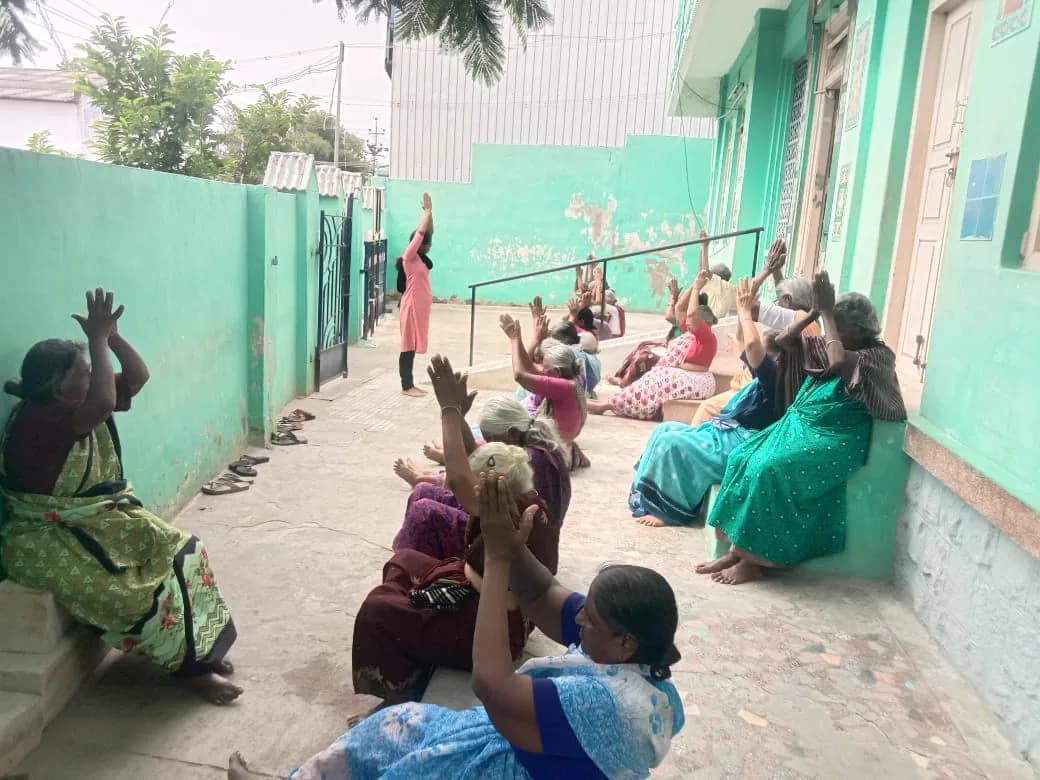 Residents gathered and exercising in the courtyard