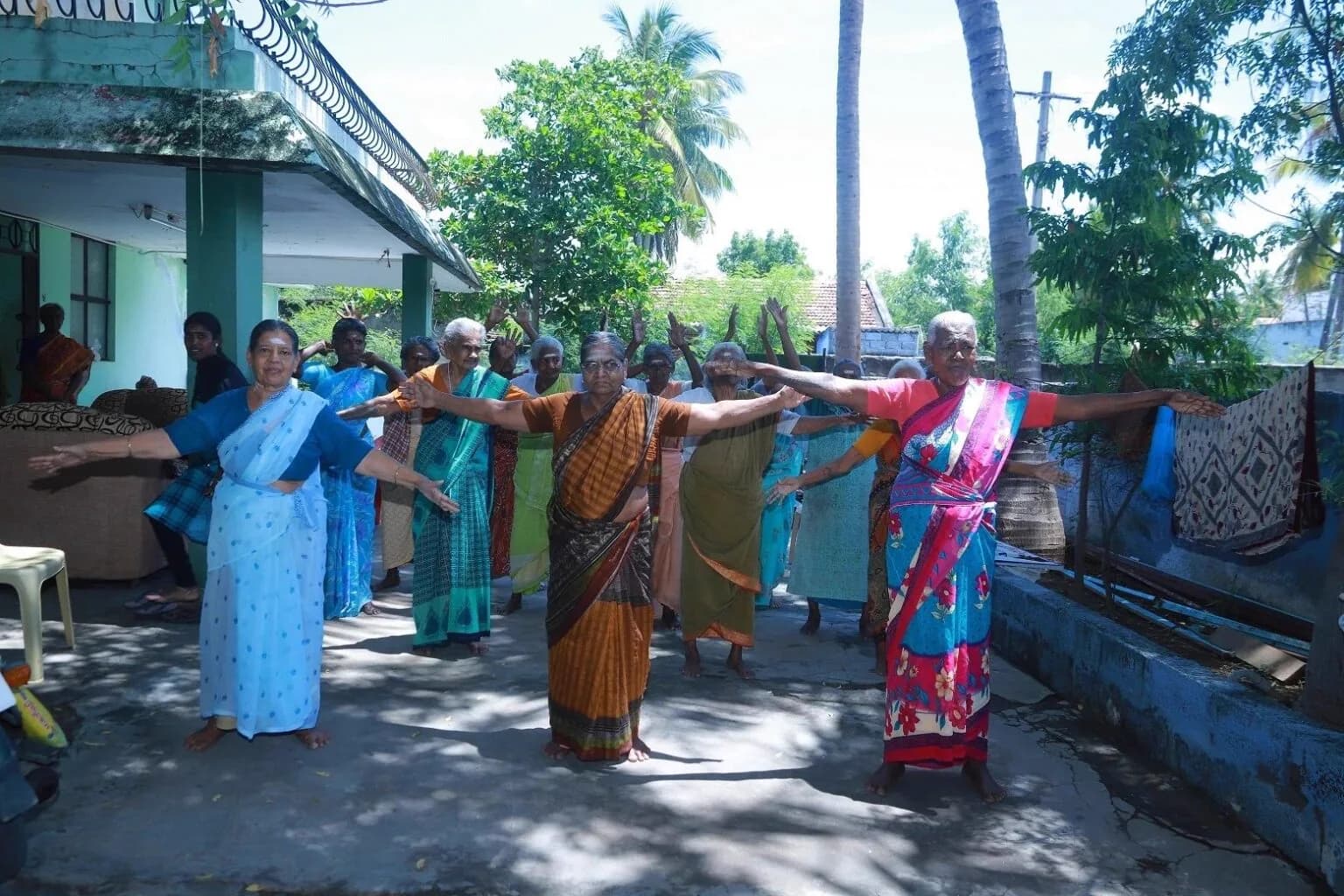 REAL Trust residents and team at the home